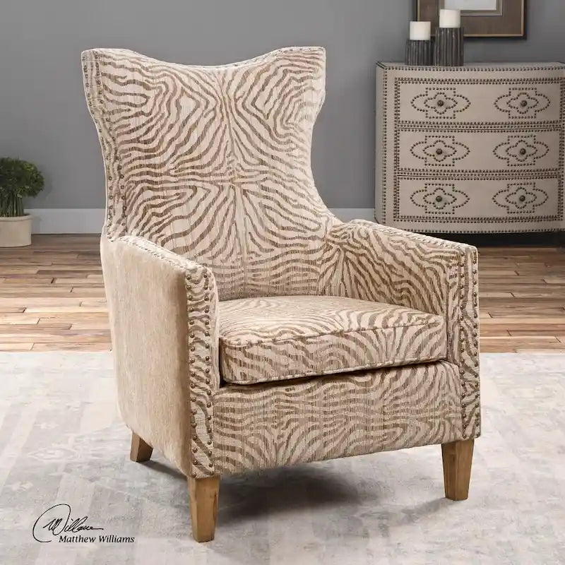 Fauteuil à motif animalier et couleurs neutres et aérées