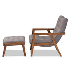 Fauteuil rembourré et son pouf