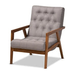 Fauteuil rembourré et son pouf