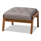 Fauteuil rembourré et son pouf