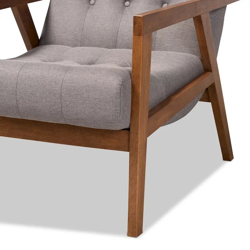 Fauteuil rembourré et son pouf